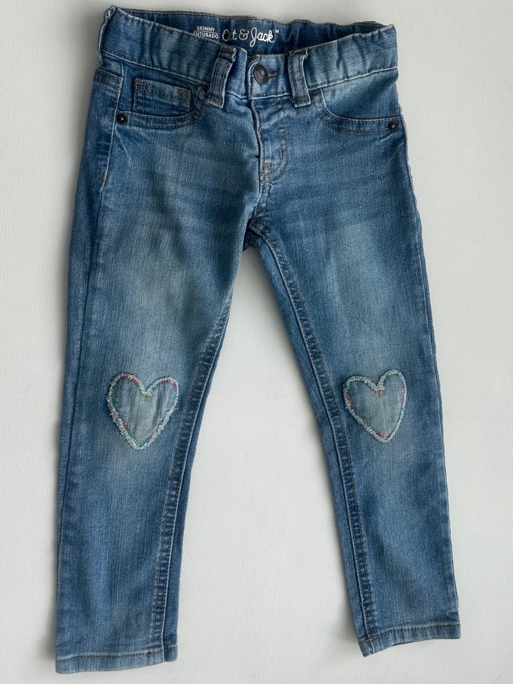Cat & Jack girl’s Denim Skinny Jeans with Embroidered Heart Knees. Size 4T.